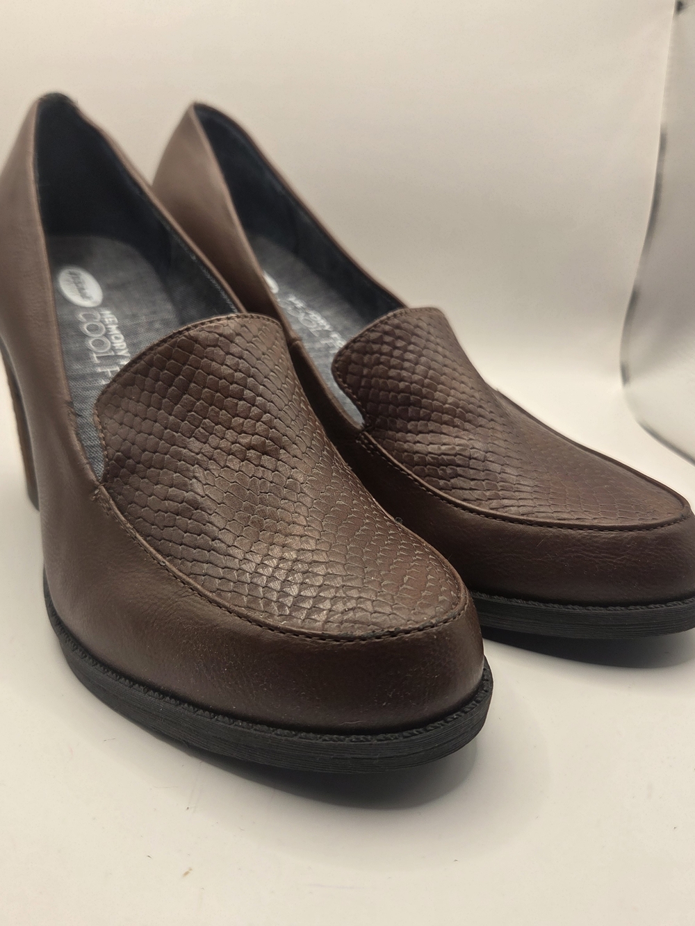 Dr. Scholl's slip-on comfort loafers featuring a textured snakeskin-pattern